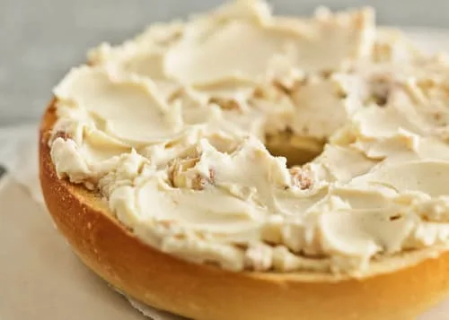 A Toasted Bruegger's Bagel with Honey Almond Shmear